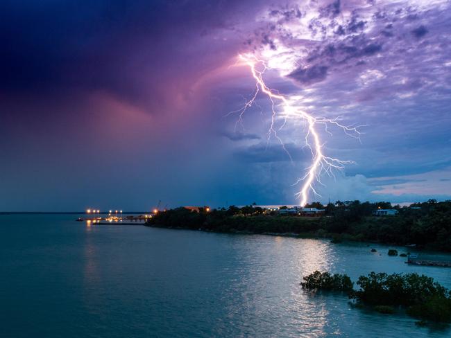 A slow moving lightning storm passes over Larrakeyah Barracks, Darwin. Picture: Che Chorley