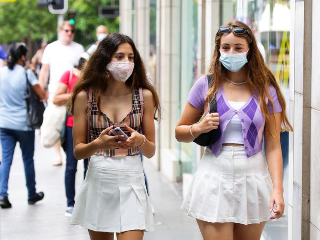 SYDNEY, AUSTRALIA - NewsWire Photos JANUARY 04, 2021: Locals Ava Ghahreman and Diana Sharma are seen wearing masks shopping in Bondi Junction as the first day of mandatory mask wearing in public places due to Covid-19 is in full swing, in Sydney, Australia. Picture: NCA NewsWire / Gaye Gerard