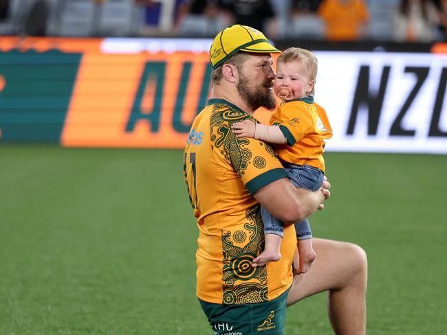 SYDNEY, AUSTRALIA - SEPTEMBER 21:  James Slipper of the Wallabies shares a moment with his son after The Rugby Championship & Bledisloe Cup match between Australia Wallabies and New Zealand All Blacks at Accor Stadium on September 21, 2024 in Sydney, Australia. (Photo by Matt King/Getty Images)