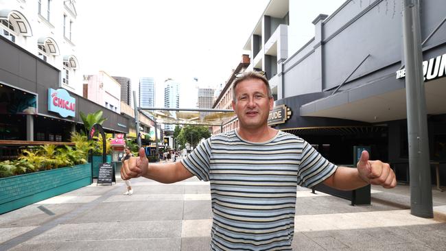 Look at my Cairns tan. British tourist William Poole in Brunswick St Mall. Picture: David Clark