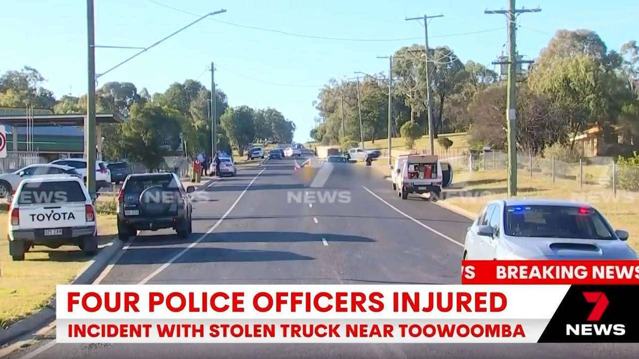 Four police officers have been injured and three police vehicles have been damaged following an alleged stolen truck incident north of Toowoomba today. Picture: 7 NEWS