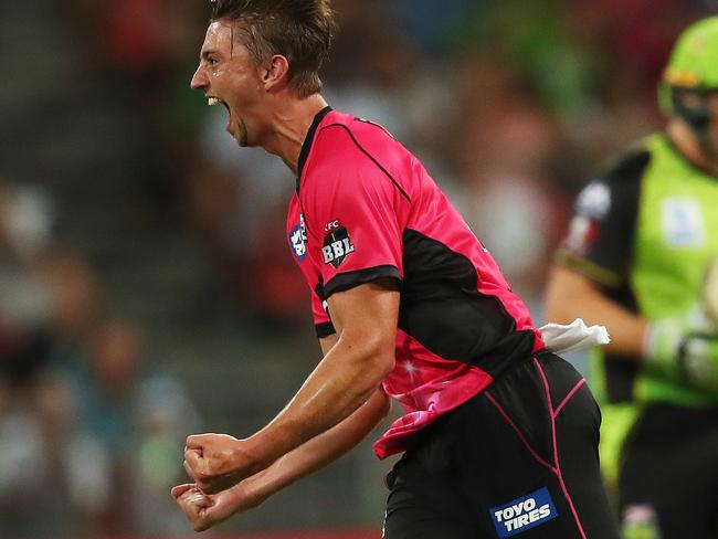 SixersÕ Daniel Sams celebrates his wicket of Shane Watson during opening game of BBL 07 Big Bash match between the Sydney Thunder and Sydney Sixers at Spotless Stadium. Picture. Phil Hillyard