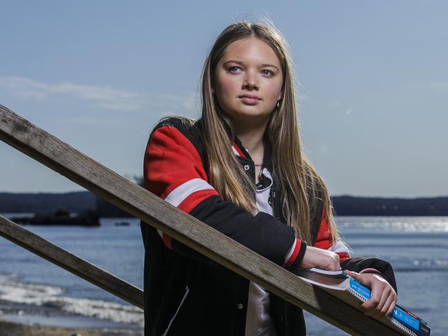 Holly Pritchard, 17, is in year 12 at Batemans bay High School. The PritchardÃs family property was impacted by bushfire at the start of the year and then Holly has had to study for her HSC during the COVID-19 pandemic. Holly is pictured at Caseys Beach near her home. Picture by Sean Davey.