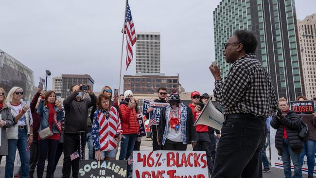 Donald Trump supporters outside the TCF Center in downtown Detroit, Michigan. Picture: AFP.