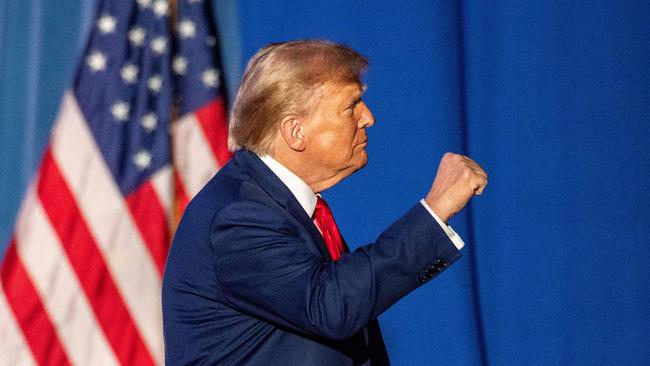 Donald Trump leaves after speaking during a campaign rally at the University of New Hampshire.