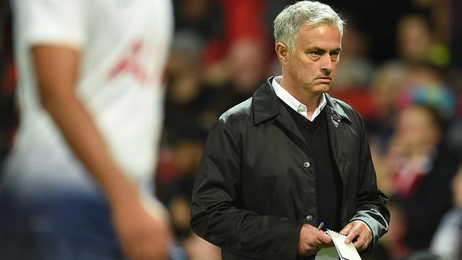 Manchester United's Portuguese manager Jose Mourinho leaves the pitch at halftime during the English Premier League football match against Tottenham Hotspur at Old Trafford in Mancheste. Photo: AFP