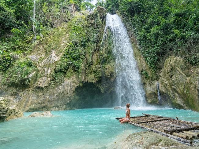 Young woman contemplating a beautiful waterfall on the Cebu Island in the Philippines. People travel nature loving concept. One person only enjoying outdoors and tranquillity in a peaceful environmentEscape 13 May 2025Tuesday coverPhoto - Getty Images