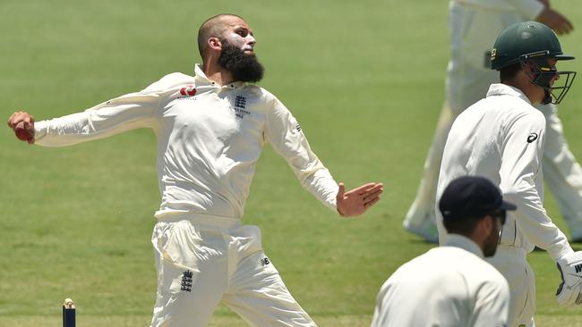 England's spinner Moeen Ali bowls to Cricket Australia XI in their tour match in Townsville last week. Picture: AFP Photo/Peter Parks