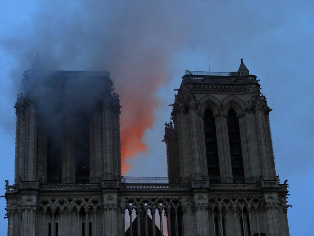 Smoke and flames fill the sky as a fire burns at the Notre Dame Cathedral. Picture: Philippe Wojazer