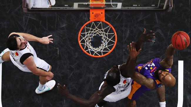 Sydney Kings star Josh Powell scores a basket during the Sydney Kings v Melbourne United NBL game on Sunday.