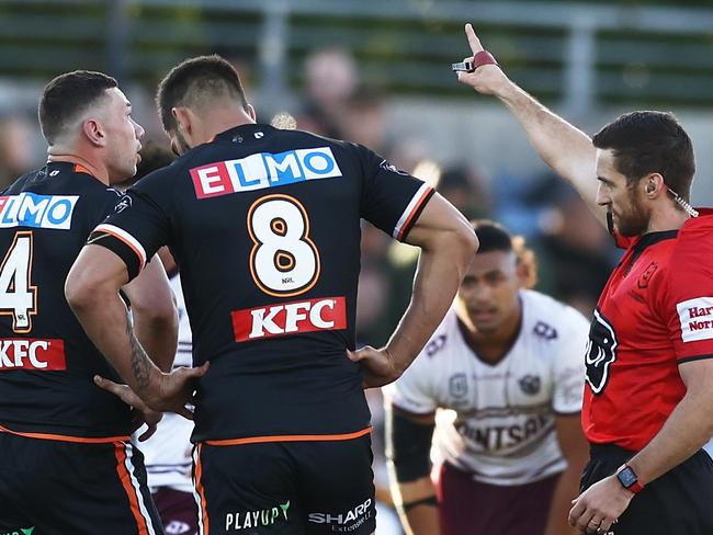 SYDNEY, AUSTRALIA - JUNE 12:  Brent Naden of the Tigers is sent off by referee Peter Gough for a tackle on Jake Trbojevic of the Sea Eagles during the round 14 NRL match between the Wests Tigers and the Manly Sea Eagles at Campbelltown Stadium, on June 12, 2022, in Sydney, Australia. (Photo by Matt King/Getty Images)