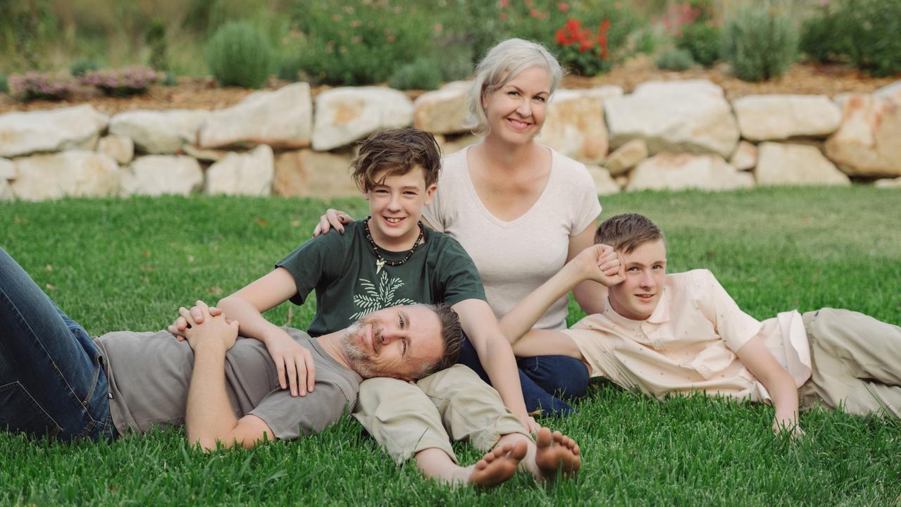 Jody Allen pictured here at home with her family: son in black t shirt: Flynn, 12 , Jody Allen, son in white polo shirt, Nate, 13 and husband Brendan Allen. Picture: Jody Allen