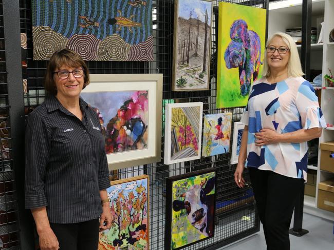 ENJOY ART: Gallery 107 President Carolyn Tillman and Councillor Kaye Maguire inspecting some exhibition submissions