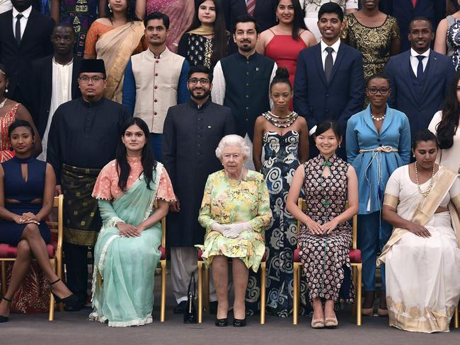 The Queen with recipients of the Young Leader Awards at Buckingham Palace. Picture: AP