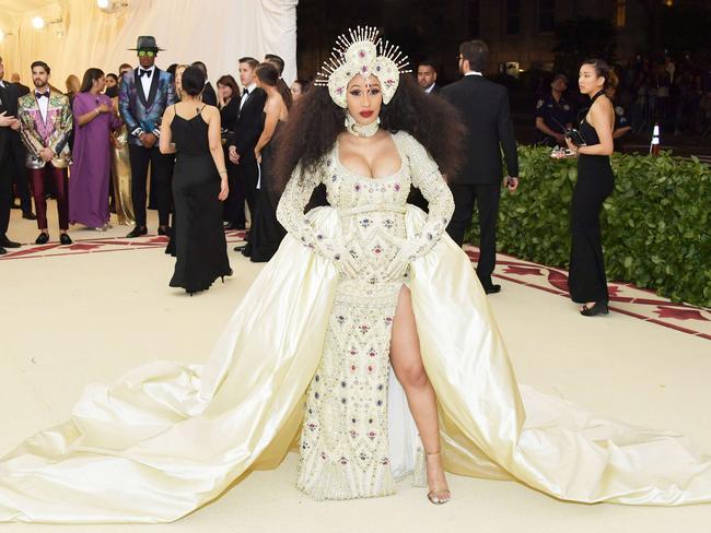 Cardi B’s gown and headpiece is the creation of Jeremy Scott. Picture: Getty