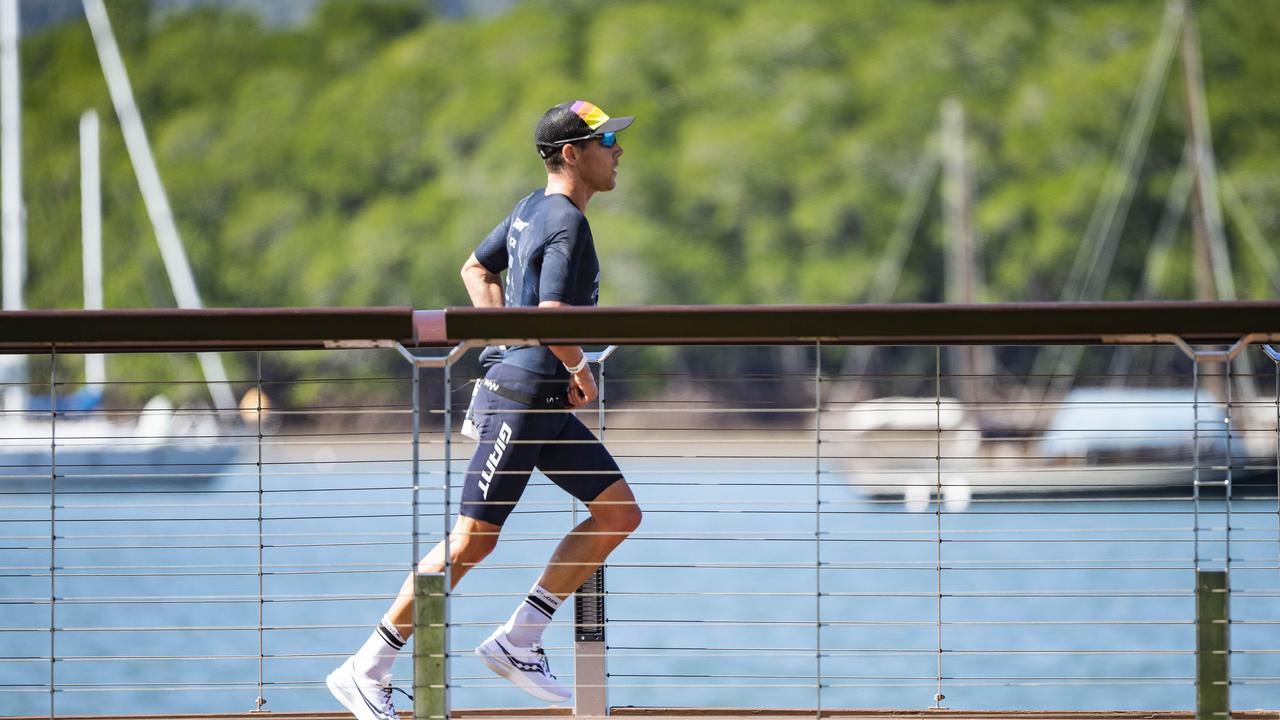 Cairns Iron Man - Sam Appleton (NZ) in second place during the run leg along the waterfront. Picture: Brian Cassey