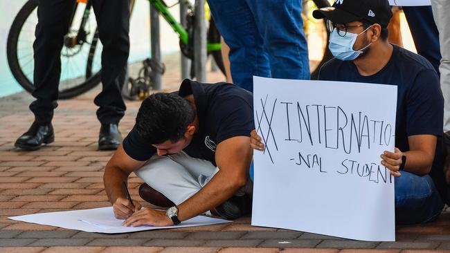 Students wrote on posters to show their support. Pic: Pema Tamang Pakhrin