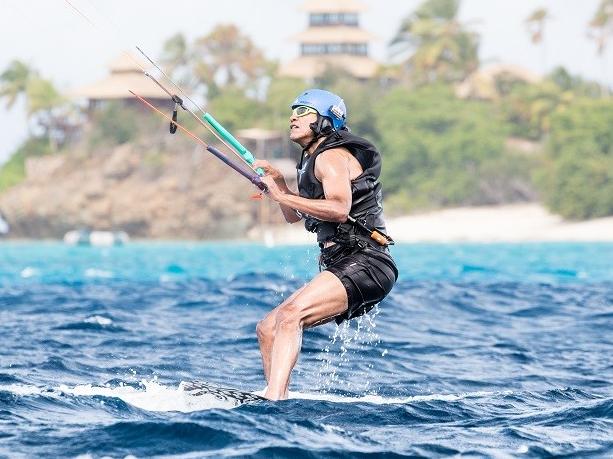 Barack Obama tries kitesurfing. Picture: AFP