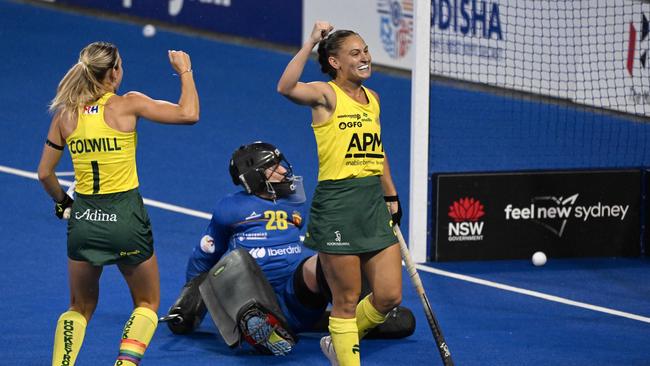 Australiaâs Jade Smith (R) celebrates her goal during the women's field hockey match between Australia and Spain in the FIH Hockey Pro League in Sydney on February 8, 2025. (Photo by Saeed KHAN / AFP) / -- IMAGE RESTRICTED TO EDITORIAL USE - STRICTLY NO COMMERCIAL USE --