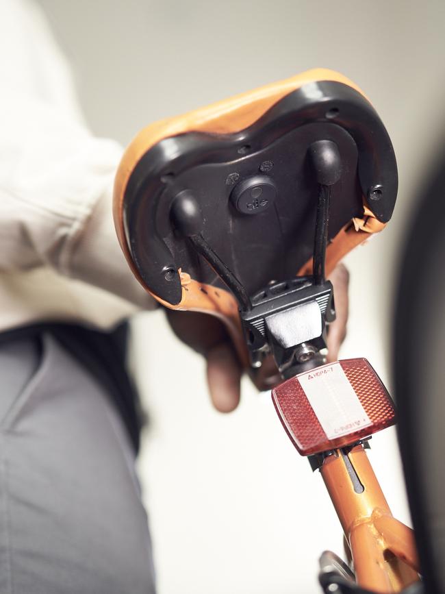 A Tile tracking device under a bicycle seat.