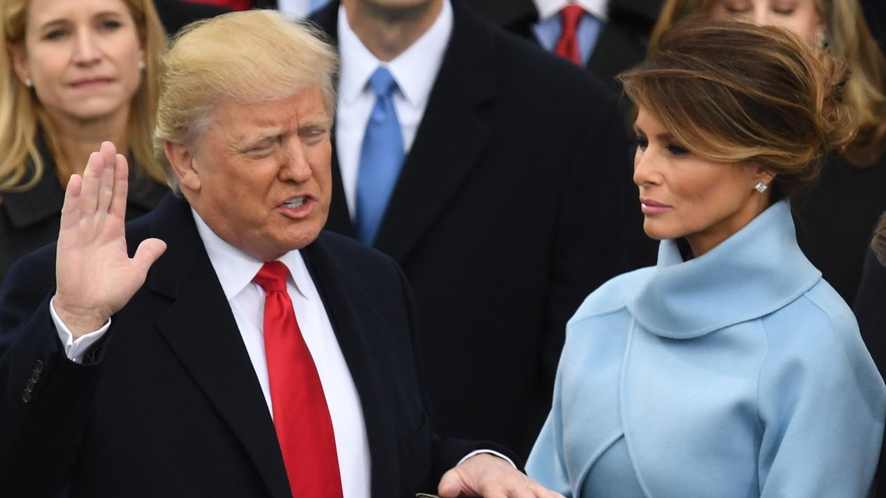 Mrs Trump with her husband being sworn in at his 2017 inauguration. Picture” Mark Ralston/AFP