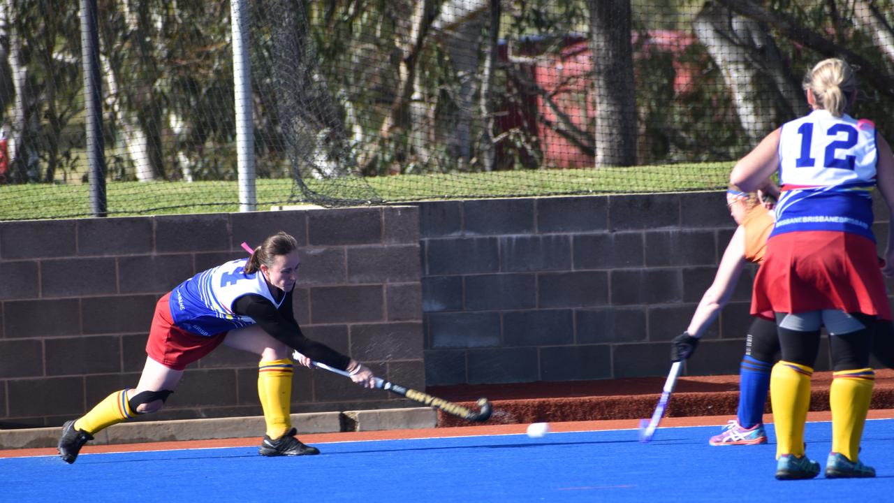 Ashlee Scougall in possession for Brisbane in their clash against Maryborough at the 2021 Queensland Hockey Women's Masters Championship.