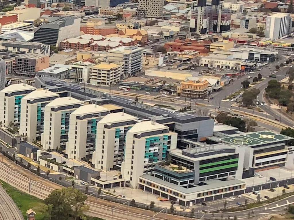 The Adelaide BioMed City precinct on North Terrace as seen from above. Together the Royal Adelaide Hospital, South Australian Health and Medical Research Institute, University of Adelaide Health and Medical Sciences Building and UniSA Cancer Research Institute represent a $3.2 billion investment in the site. Credit: Raymond Spencer