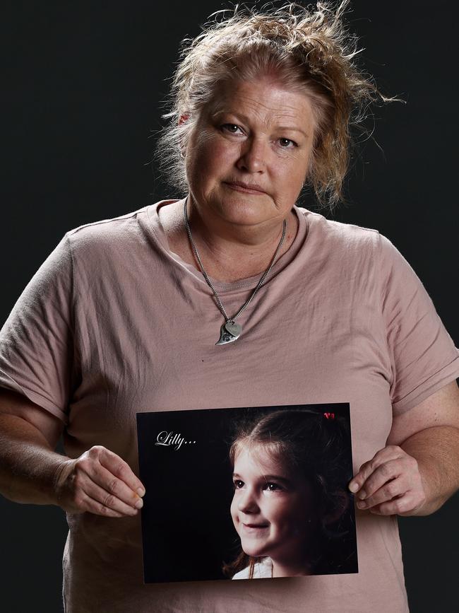 Jasmine Osborne holds a picture of her daughter Lilly Osborne, who died by suicide at age 16 in November 2021. Picture: Tara Croser