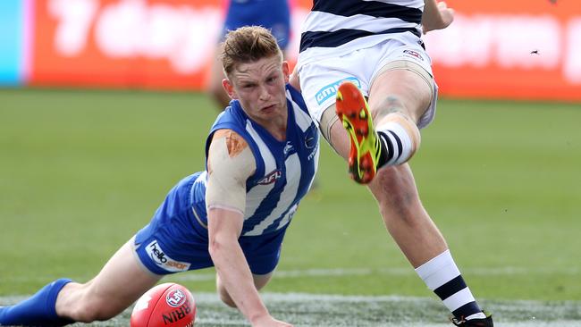 Jack Ziebell spent time off the ground after cutting his knees on the LED lights at GMHBA Stadium. Picture: Michael Klein