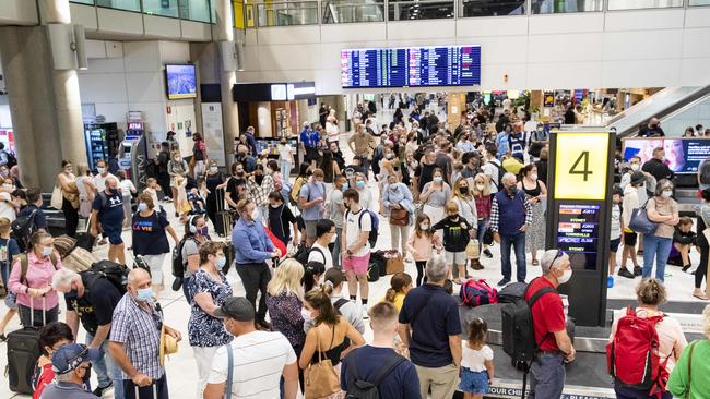 Crowds at Brisbane Airport during April school holidays. Picture: Richard Walker