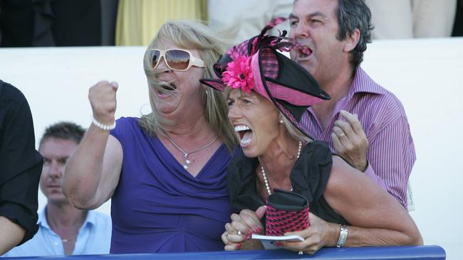Gillian Heinrich watches as Military Rose wins the Magic Millions 2YO Classic in 2010.