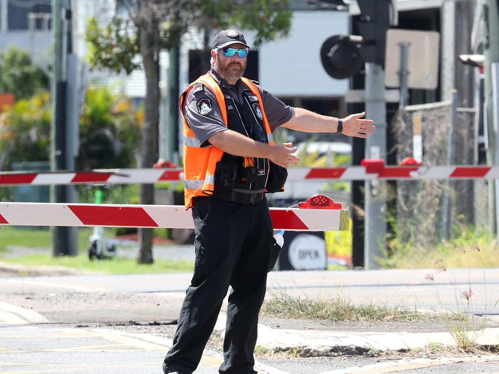 Queensland Police at the scene. Picture: Liam Kidston