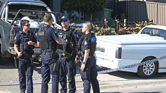 Police at the address where a man was shot multiple times. Picture, John Gass