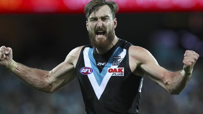 Charlie Dixon celebrates a vital goal against Collingwood. Picture: Sarah Reed