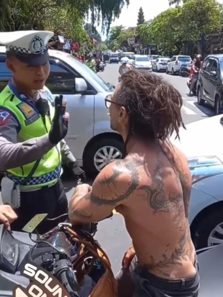 A tourist in Bali was stopped by police for not wearing a helmet. Picture: Instagram/moscow_cabang_bali