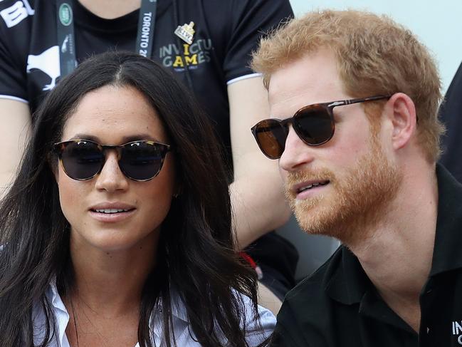 TORONTO, ON - SEPTEMBER 25:  Prince Harry (R) and Meghan Markle (L) attend a Wheelchair Tennis match during the Invictus Games 2017 at Nathan Philips Square on September 25, 2017 in Toronto, Canada  (Photo by Chris Jackson/Getty Images for the Invictus Games Foundation )