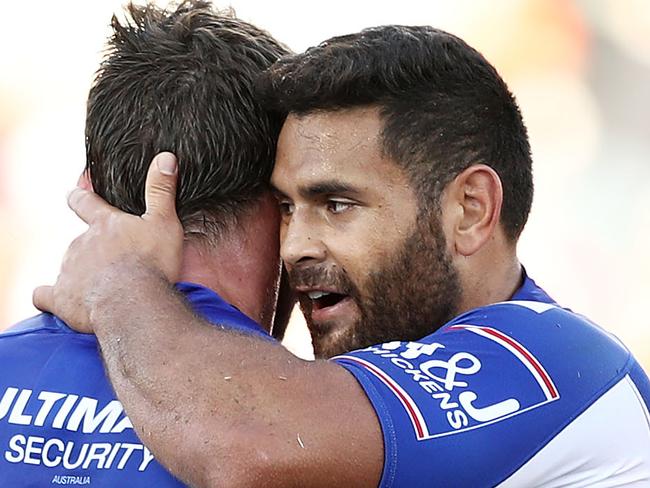 SYDNEY, AUSTRALIA - MARCH 31: Rhyse Martin of the Bulldogs (R) celebrates with Josh Jackson (L) at fulltime during the round three NRL match between the Wests Tigers and the Canterbury Bulldogs at Campbelltown Stadium on March 31, 2019 in Sydney, Australia. (Photo by Matt King/Getty Images)