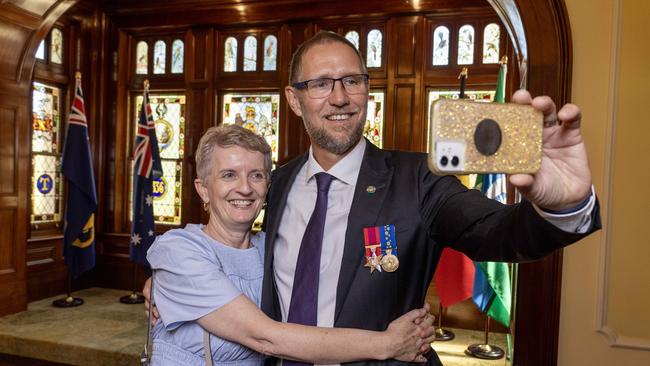 Fiona Harris and Dr Richard Harris take a selfie together after he was sworn in as the new Lieutenant governor of South Australia. Picture: Kelly Barnes