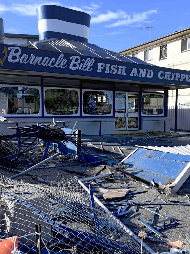 The scene where Preston ploughed through a fence and smashed into cars and outdoor furniture at Barnacle Bill in Plympton. Picture: NCA NewsWire/Naomi Jellicoe