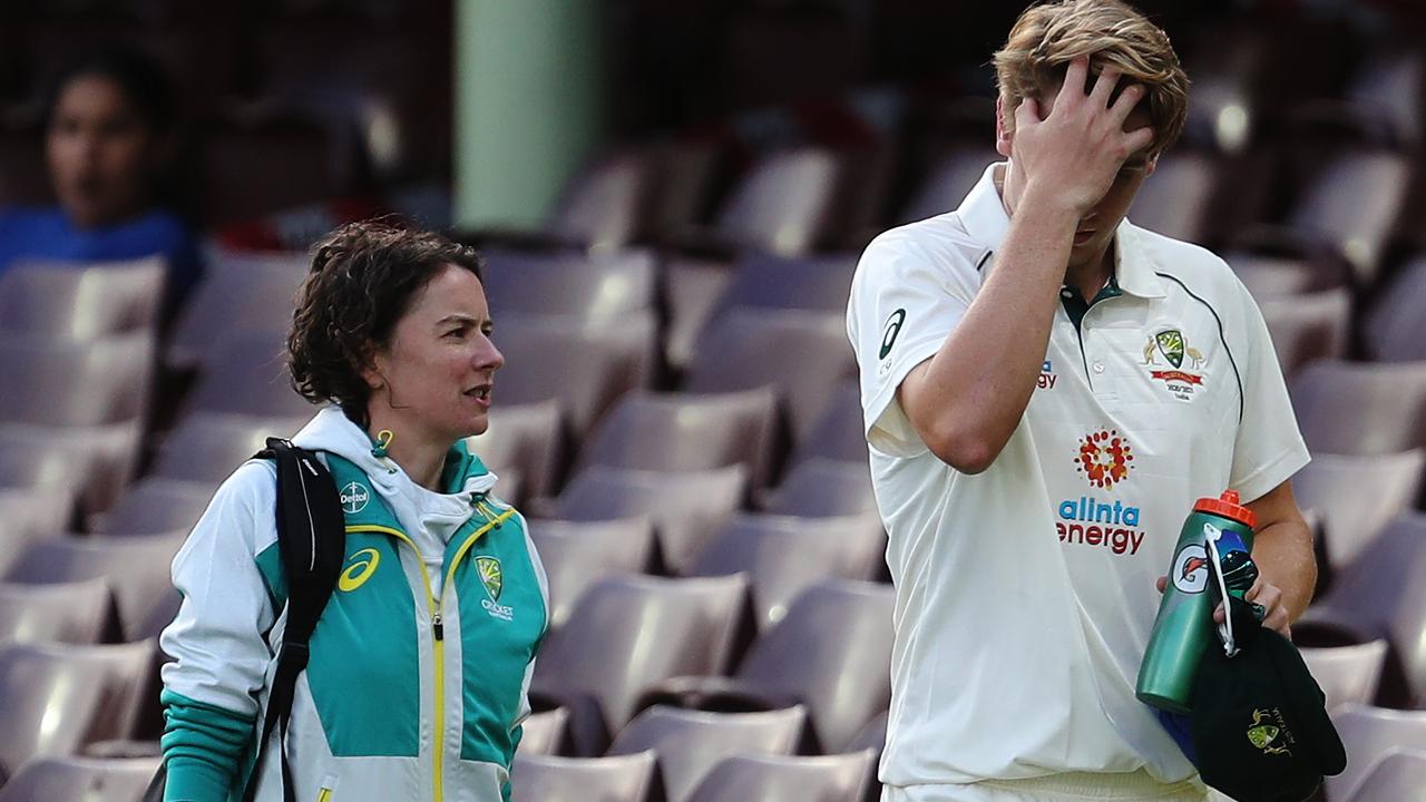 Green is taken from the field. Picture: Getty Images