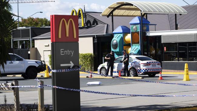 The crime scene at the police shooting at McDonald’s Sunnybank. (AAP Image/Attila Csaszar)