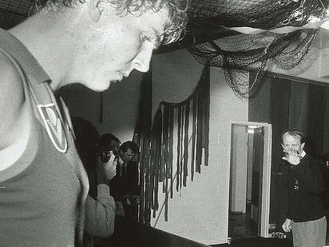 Jim Stynes cops a blast from Melbourne coach John Northey in the rooms after his costly 15m penalty in the 1987 preliminary final. Picture: Wayne Ludbey