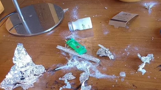 Photos of the deluxe suite show pieces of aluminium foil scattered on the desk and traces of an unknown white powder. Picture: Supplied