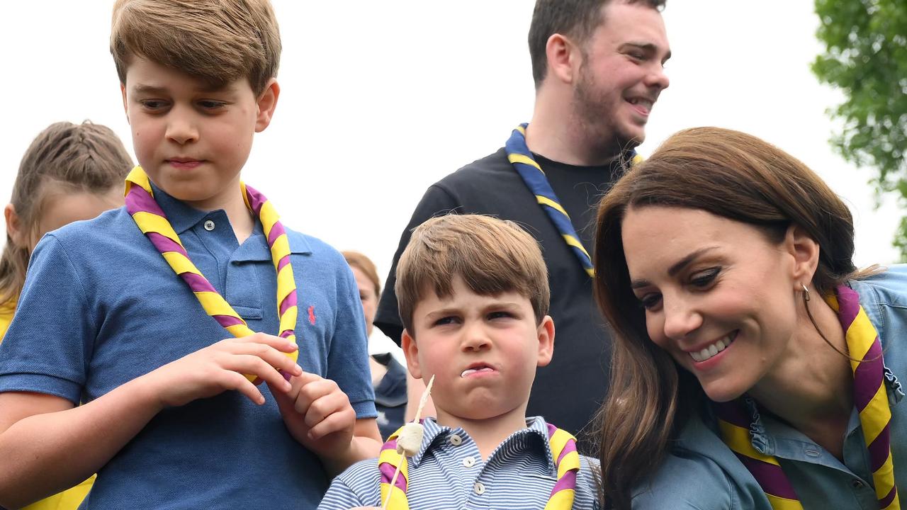 Prince George of Wales, Prince Louis of Wales and Catherine, Princess of Wales toast marshmallows as they take part in the Big Help Out. Picture: Getty Images