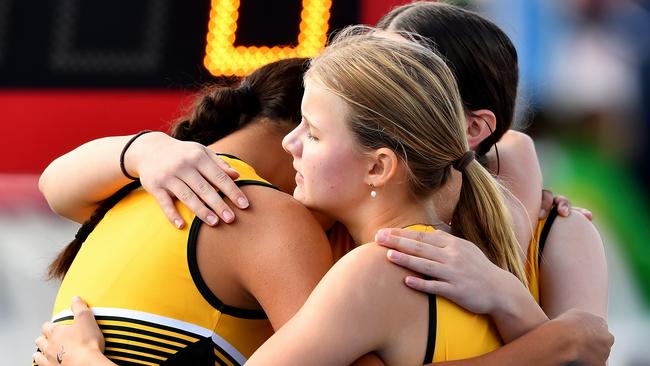 Taylor Smith congratulates her teammates after competing in the Girls Under 15 Heptathlon.