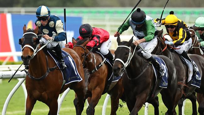 SYDNEY, AUSTRALIA - SEPTEMBER 07: Tommy Berry riding Buckaroo wins Race 8 Daily Press Chelmsford Stakes during Sydney Racing at Royal Randwick Racecourse on September 07, 2024 in Sydney, Australia. (Photo by Jeremy Ng/Getty Images)