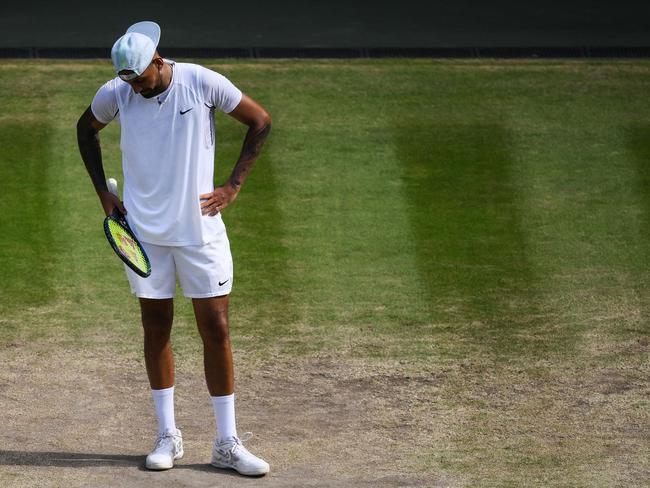 Nick Kyrgios hangs his head. Picture: AFP