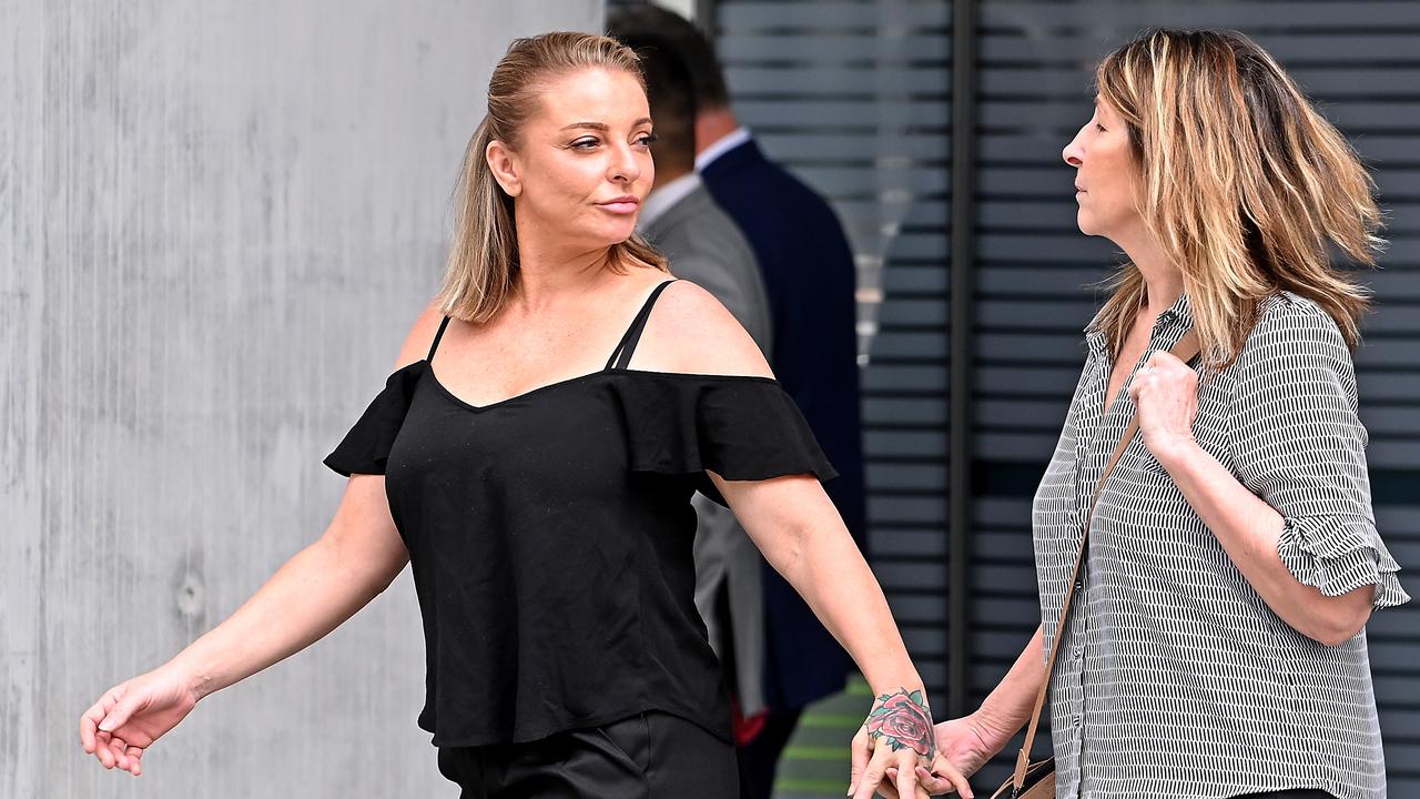 Kristy Lee Edwards (left) received a 12-month jail term, suspended for 18 months, over the violent incident on the Gold Coast back in 2021. She left court in the company of family and supporters. Picture: NewsWire / John Gass