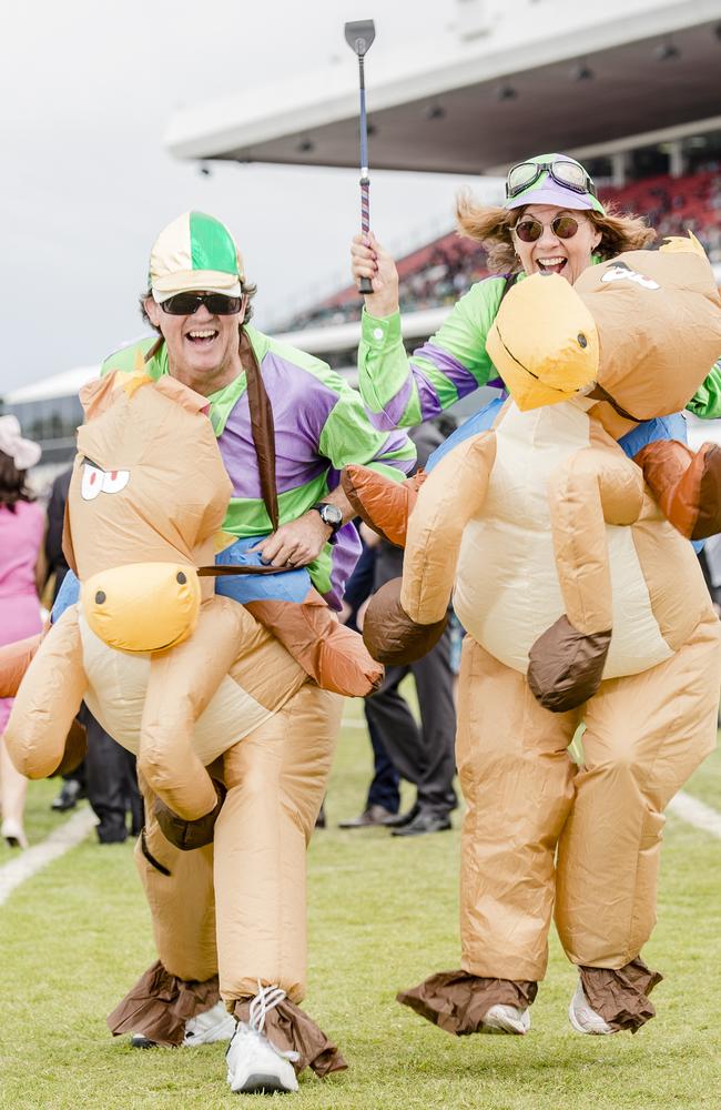 Greg Millard and Deslys Dubois riding their Deflated Australian Ponies at the 2014 Melbourne Cup. Picture: Jason Edwards.