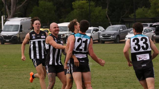 Crib Point players celebrate a goal. Picture: Euan Poulton